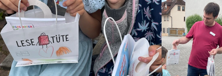 Kinder bei der Übergabe der Lesetüten